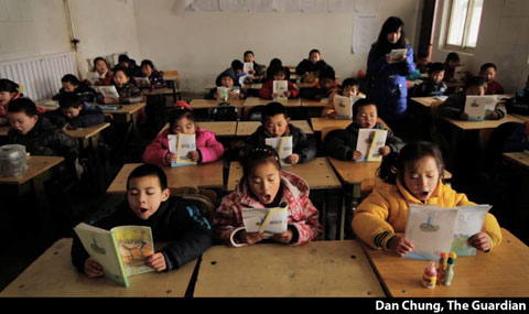 Migrant Chinese children in a private school in Beijing. Photography by Dan Chung of The Guardian.