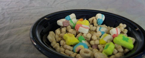 Why do American expatriates search for Lucky Charms, an obscure box of breakfast cereal, on St. Patrick's Day?