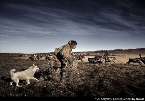 Yuri Kozyrev photograph of a reindeer herder from 'The Yamal Peninsula: A Land and People Threatened,' one documentary in the 'Consequences by NOOR' exhibition.