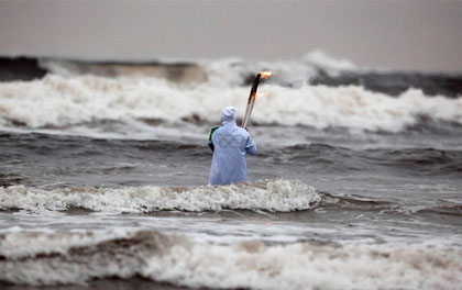 Vancouver 2010 Olympic Torch in the Pacific Ocean near Tofino, British Columbia.